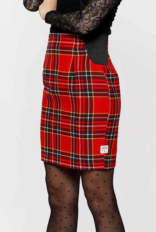 Woman wearing red tartan Christmas suit