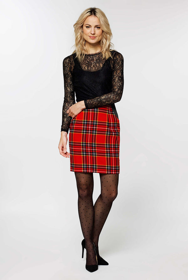 Woman wearing red tartan Christmas suit