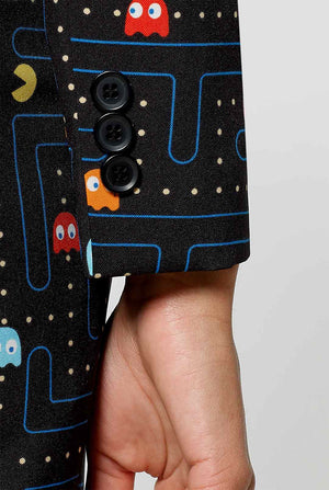 Woman wearing black dress suit with Pac-Man print