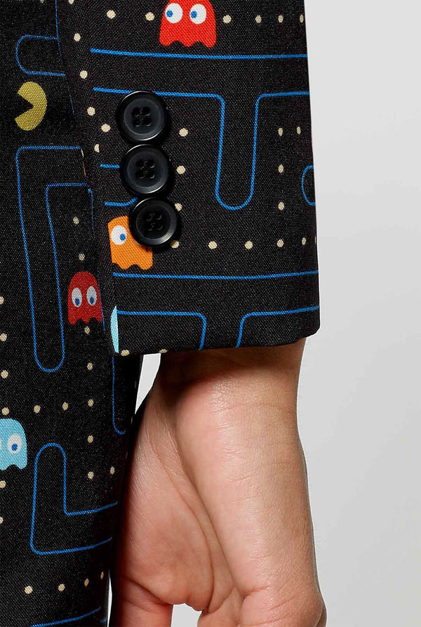 Woman wearing black dress suit with Pac-Man print