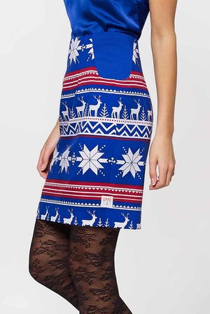 Woman wearing blue and red Nordic themed Christmas suit