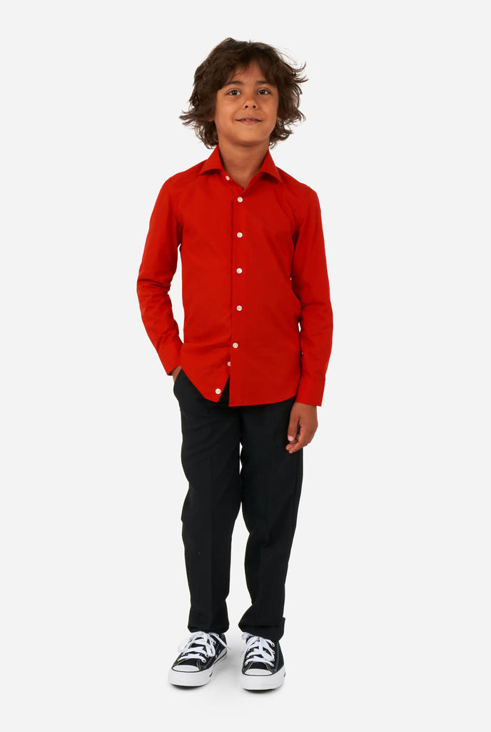 Boy wearing red dress shirt and black pants