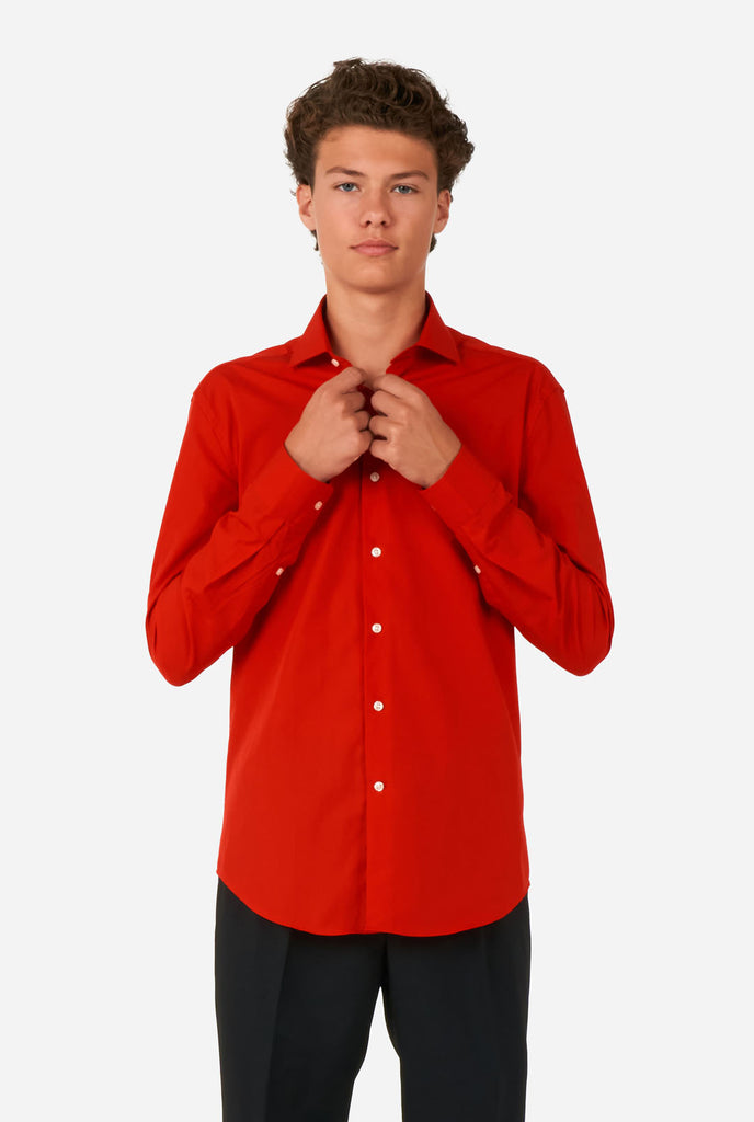 Teen wearing red dress shirt and black pants