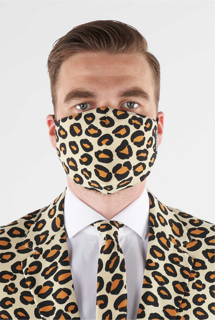Man wearing face mask of panther print facbric