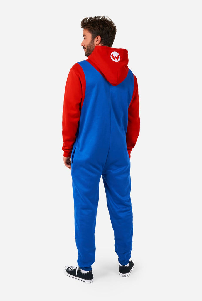 Man wearing unisex onesie with Super Mario print, view from the back
