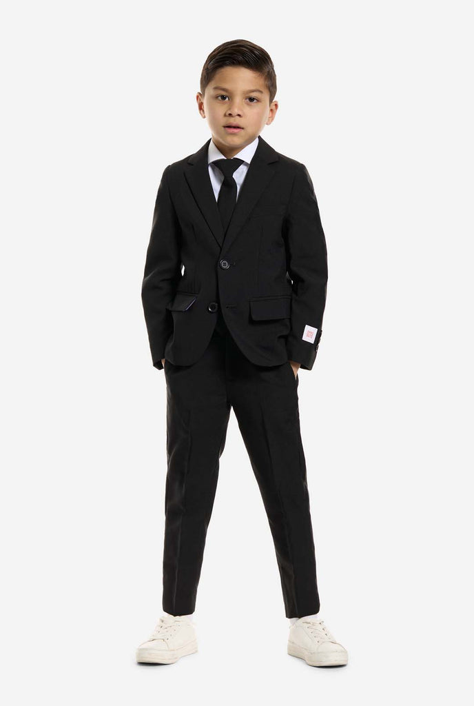 Kid wearing OppoSuits Black suit.