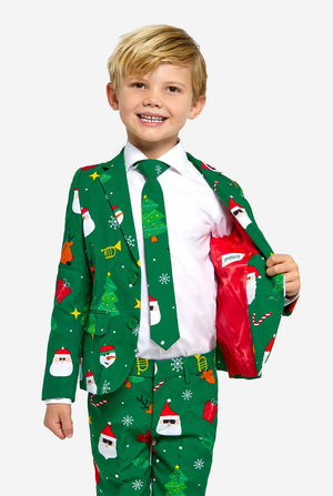 Boy wearing green Christmas suit for kids, with Christmas icons.