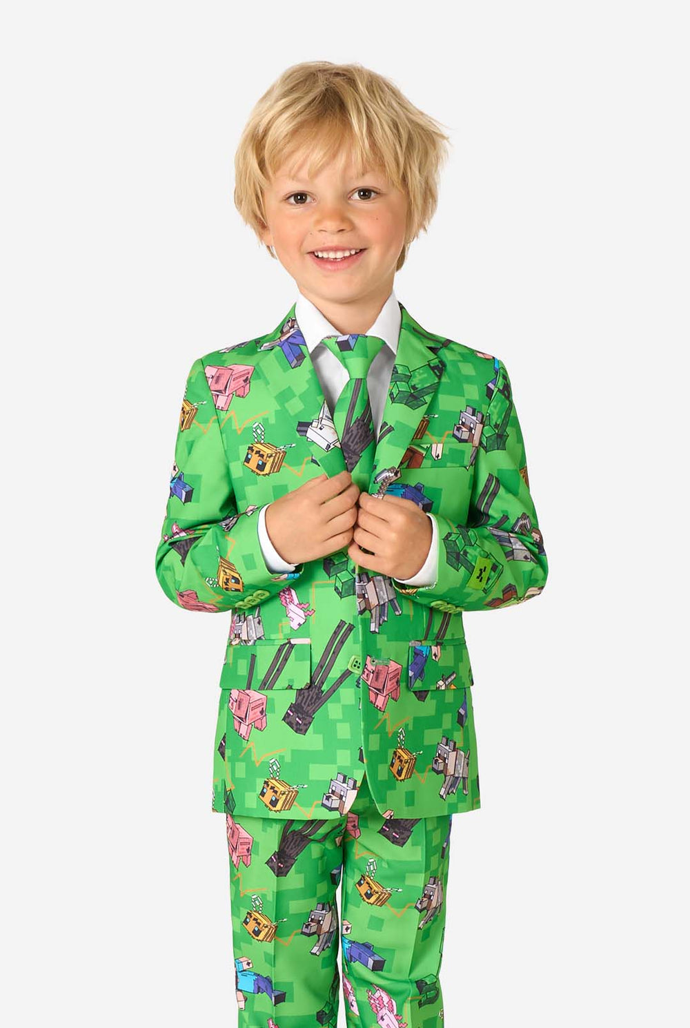 Kid wearing a bright green Minecraft suit with iconic characters, including Creepers and Steve – full view from the front.