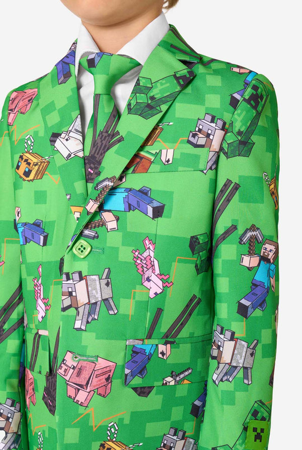 Zoomed-in view of Minecraft suit boys print on blazer and tie, featuring Steve, Alex, Creepers, and animals in pixelated style.