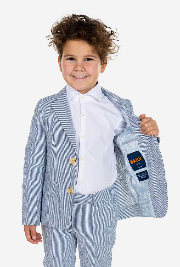 Kid wearing blue and white stripes Seer Sucker suit