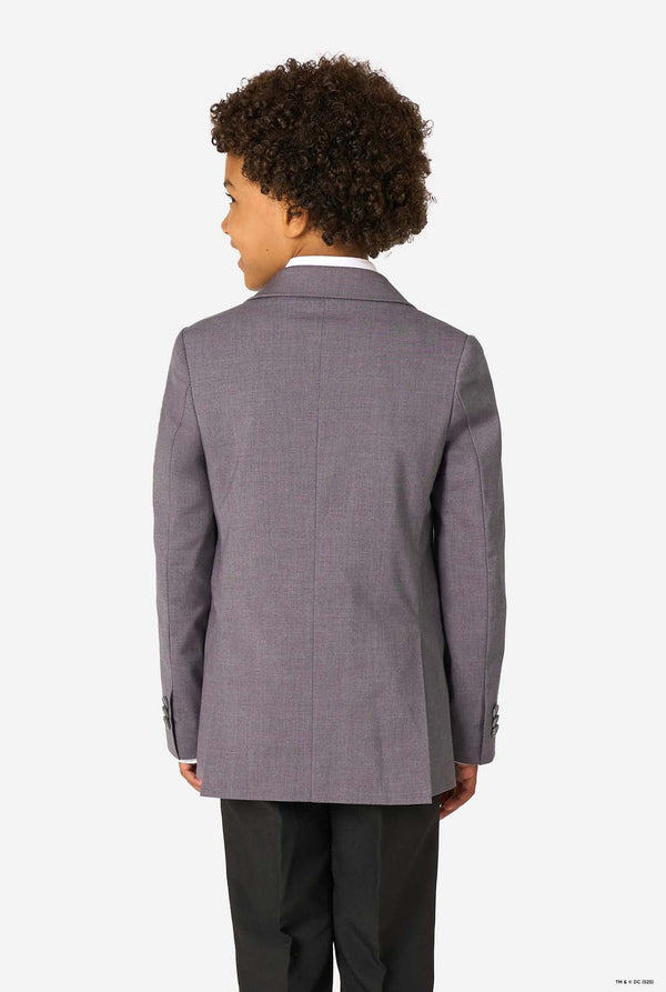 Person wearing a gray suit on a white background