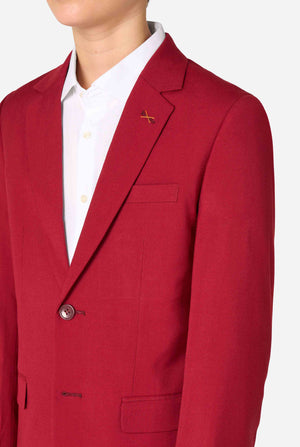 Teen boy wearing a stylish burgundy red suit with a white dress shirt, looking confidently. Perfect formal outfit for boys' special occasions, weddings, and parties. Chest close-up.