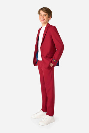 Teen boy wearing a stylish burgundy red suit with a white dress shirt, looking confidently in the camera. Perfect formal outfit for boys' special occasions, weddings, and parties.