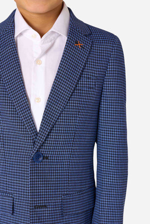 Blue checkered suit jacket worn by a person on a white background