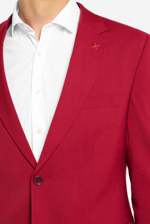 Image with light grey background and man wearing Bright Burgundy men’s suit and white shirt. Suits consists of blazer and pants. Focused on the chest.