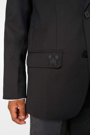 Black suit jacket with a logo patch on the chest against a white background