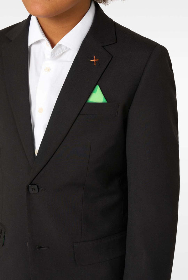 Black suit jacket with a white shirt and green pocket square on a white background