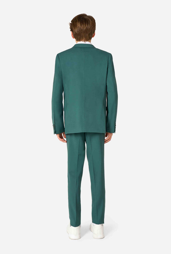 Teen boy wearing a stylish dark green suit with a white dress shirt, smiling confidently. Perfect formal outfit for boys' special occasions, weddings, and parties. View from the back.