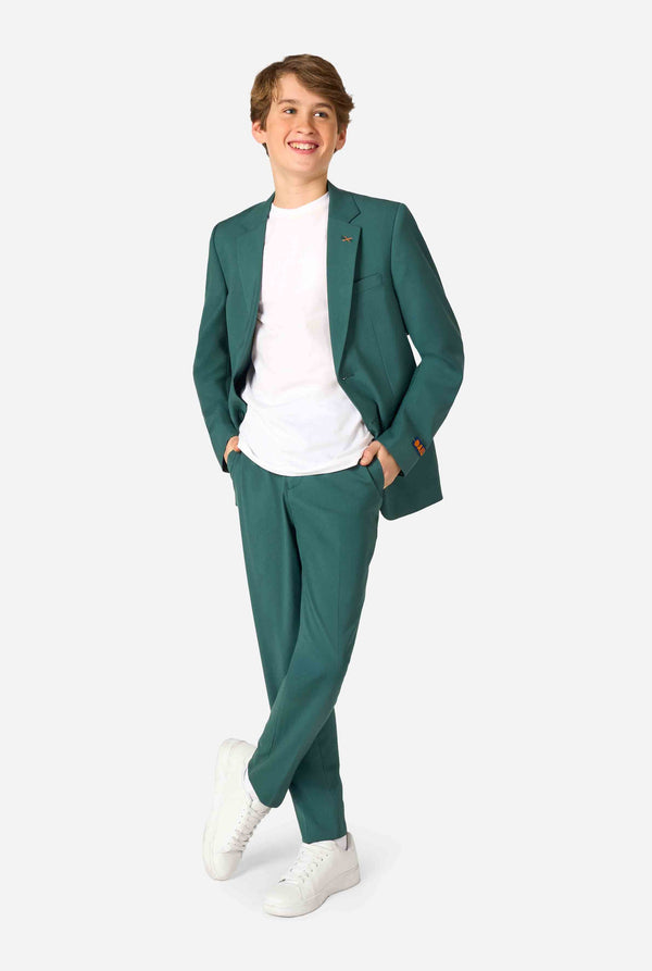 Teen boy wearing a stylish dark green suit with a white dress shirt, smiling confidently. Perfect formal outfit for boys' special occasions, weddings, and parties. Full body image.