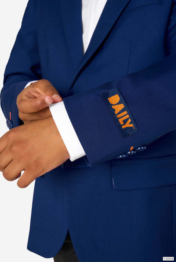 Close-up of a blue suit jacket with 'Dally' branding on a white background