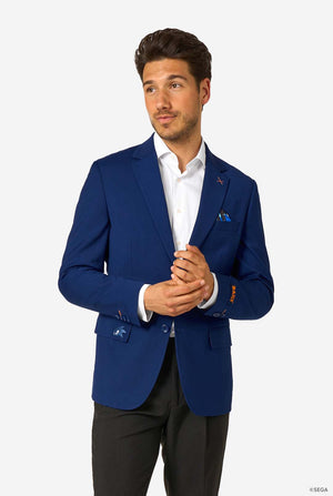 Man wearing a blue blazer with a white shirt and black pants on a white background