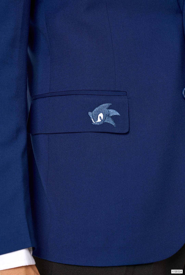 Close-up of a blue jacket with an embroidered logo on the chest pocket.