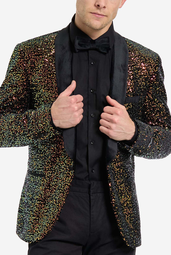 This image showcases a stylish men’s dinner jacket from OppoSuits Deluxe collection, featuring dazzling amber sequins that create a shimmering effect. The sequin blazer has a sleek satin lapel, a tailored fit. The model pairs it with a classic black dress shirt and bow tie, making this jacket perfect for formal events, holiday parties, or New Year celebrations. Ideal for men who want to stand out with bold, luxurious, and festive attire. Chest close-up.