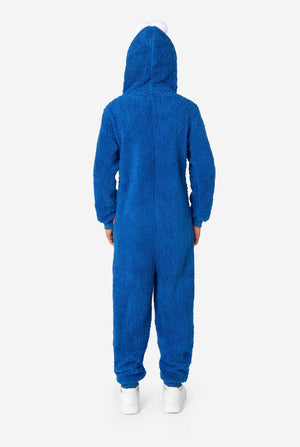 A kid is wearing a blue sesame street onesie resembling Cookie Monster. View from the back