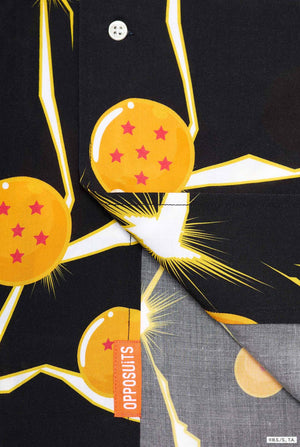 Image of black Hawaiian shirt with Dragon Ball Z print, showings Dragon Balls and lighting. Close up.