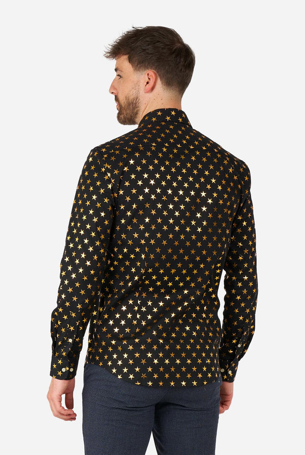 Man wearing black men's shirt with golden foil stars, view from the back