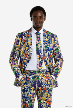 Image of a man wearing the Dragon Ball Z suit by OppoSuits. Suit has an all over print with Dragon balls, lightning, Goku, Vegeta, Piccolo, Gohan and Trunks. Suit consists of blazer, pants and a tie. Man has hands in his pocket and also wearing a white shirt.