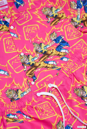 image of pink summer set consisting of shirts and shorts. Summer set has Dragon Ball Z Goku and Vegeta fighting print. Close up.