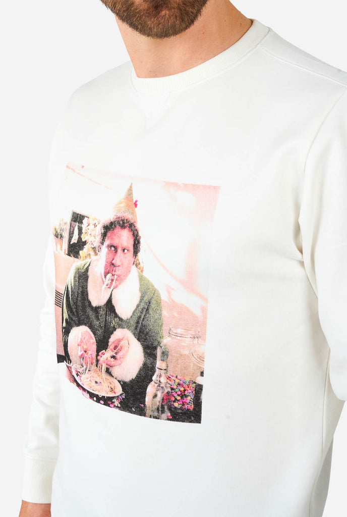 Man wearing white sweater with Elf Christmas image