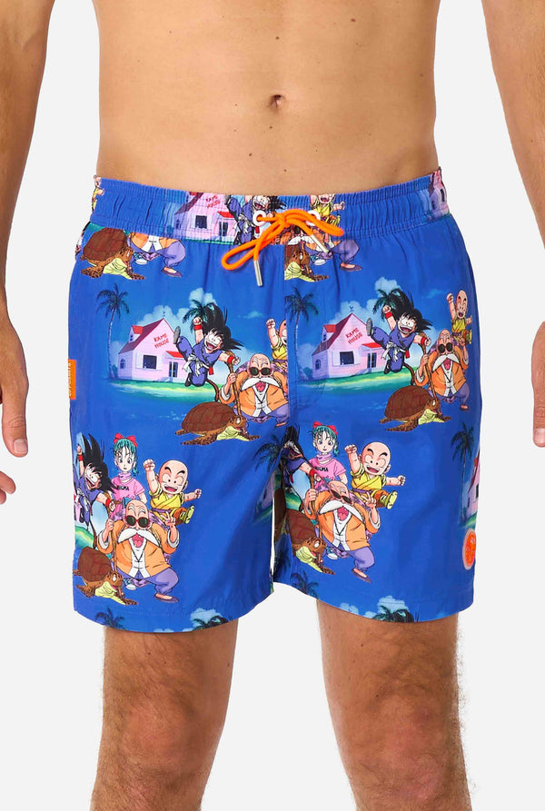 Men's blue Dragon Ball-themed swim shorts featuring Goku, Krillin, Master Roshi, and other characters at Kame House. Perfect for anime fans at the beach or pool. 