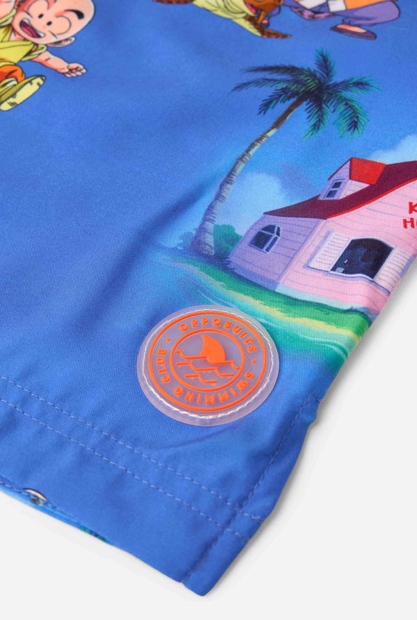 Men's blue Dragon Ball-themed swim shorts featuring Goku, Krillin, Master Roshi, and other characters at Kame House. Perfect for anime fans at the beach or pool. 