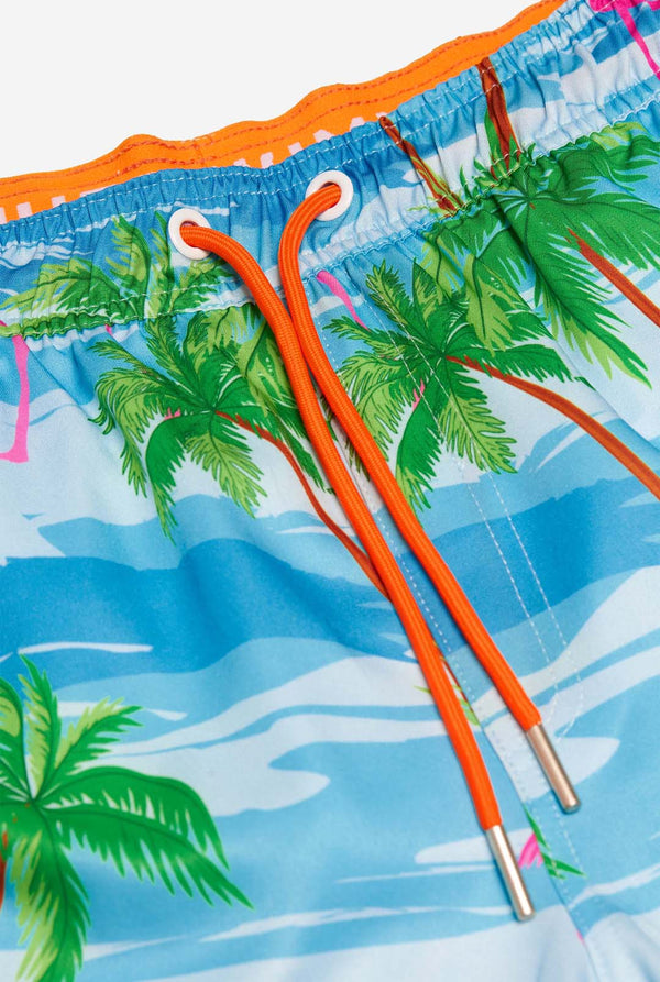 Man wearing Flaminguy swim trunks for men, close up