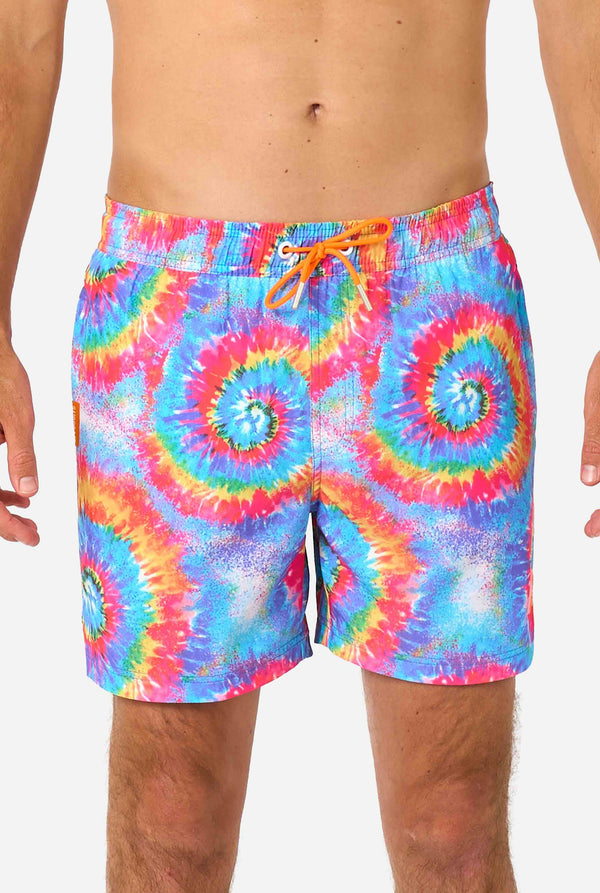 Men's rainbow tie-dye swim shorts with a bold, colorful spiral pattern. A fun and trendy choice for beach days and pool parties.