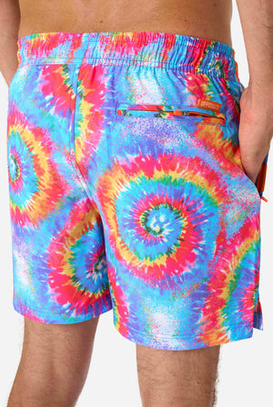 Men's rainbow tie-dye swim shorts with a bold, colorful spiral pattern. A fun and trendy choice for beach days and pool parties.