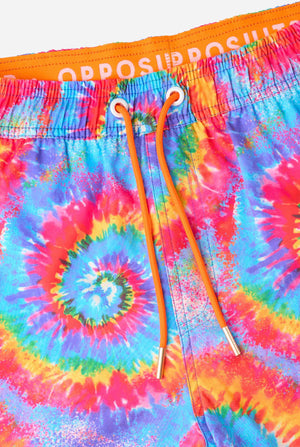 Men's rainbow tie-dye swim shorts with a bold, colorful spiral pattern. A fun and trendy choice for beach days and pool parties.