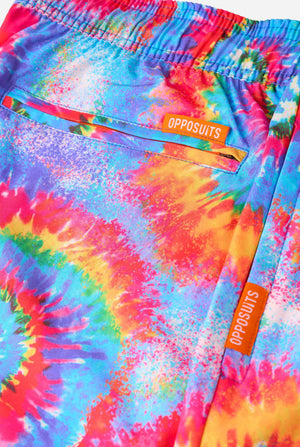 Men's rainbow tie-dye swim shorts with a bold, colorful spiral pattern. A fun and trendy choice for beach days and pool parties.