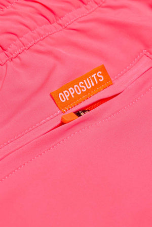 Man wearing Neon Pink Power swim trunks for men, close up