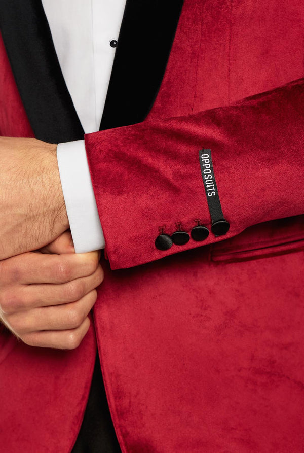 Man wearing burgundy red dinner jacket blazer, close up
