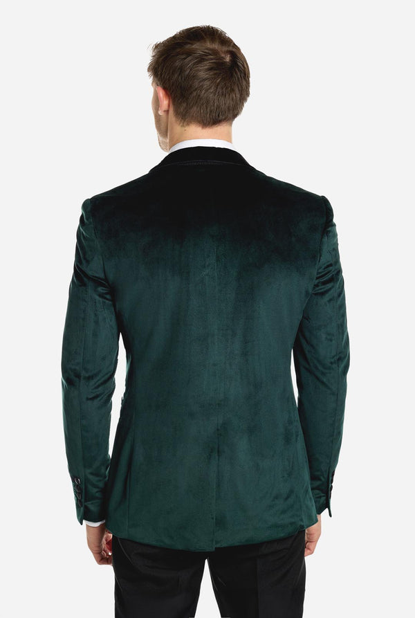 Man wearing dark green dinner jacket blazer, view from the back