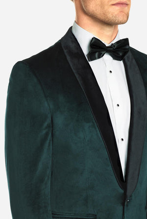 Man wearing dark green dinner jacket blazer, close up