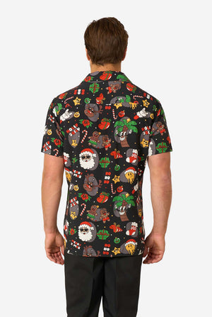 Man wearing a colorful, patterned Christmas shirt on a white background. View from the back
