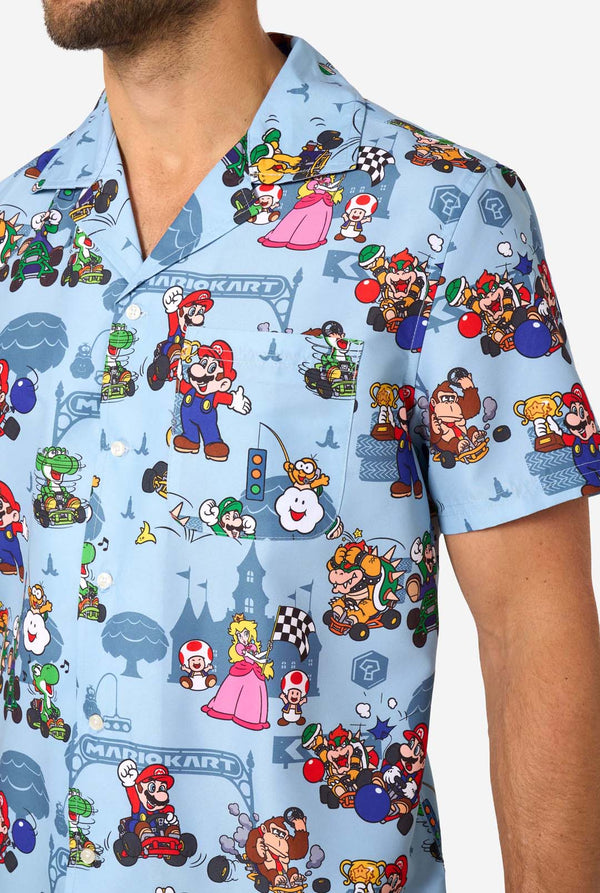 Close-up of Mario Kart shirt chest area with character designs and front pocket detail.