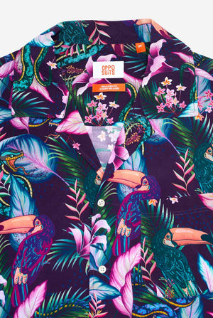 An image of a purple Hawaiian shirt with a tropical print, resembling the jungle night live. Print consists of parrots, snakes, leaves and flowers. Close up.