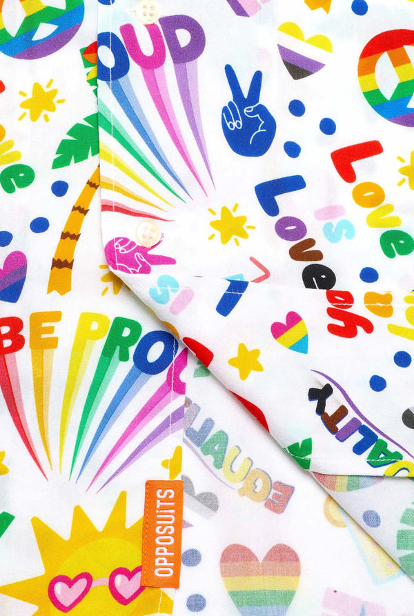Image of a white Hawaiian shirt with a rainbow pride print. The Print consists of peace symbols, hearts, and other icons. Close-up button closure. 