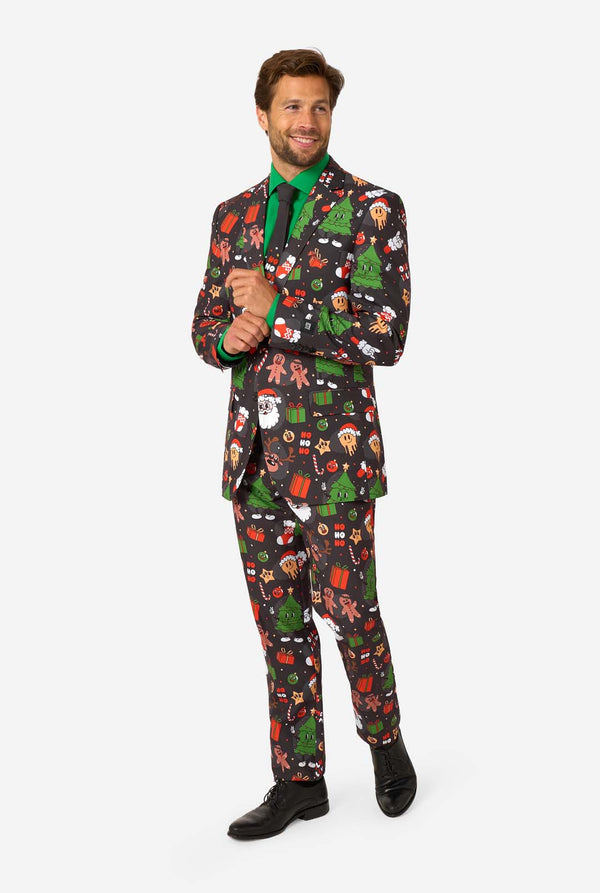 Man wearing a festive suit with Christmas-themed pattern on a white background