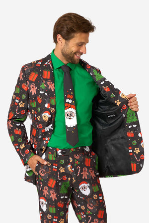 Man wearing a festive suit with Christmas-themed patterns on a white background